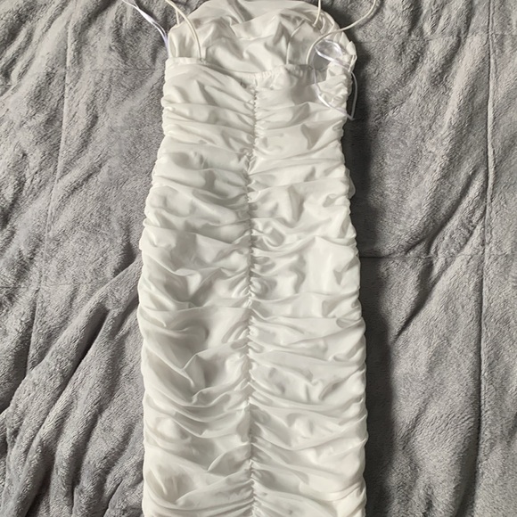 White skin tight dress. - Picture 2 of 4